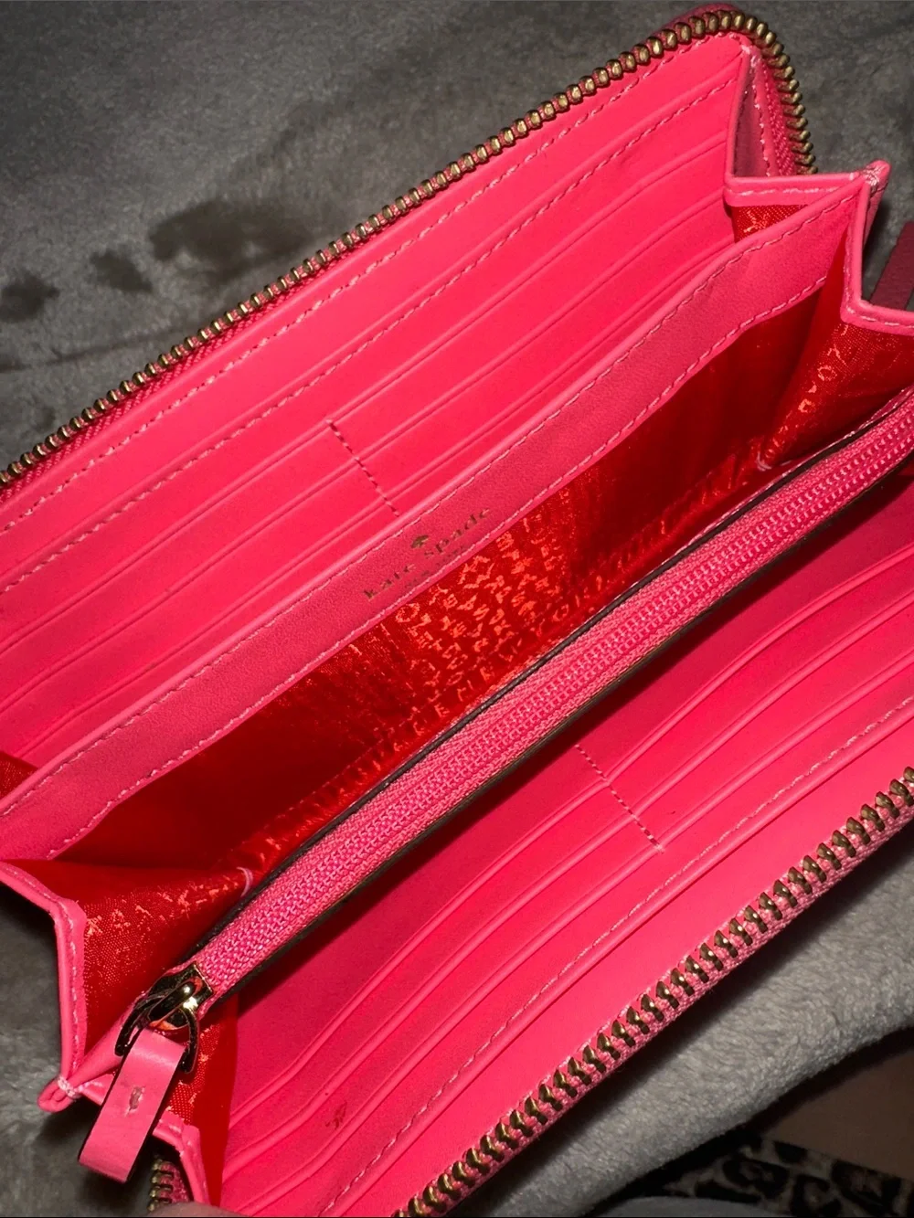 kate spade coral pink pebbled leather wristlet